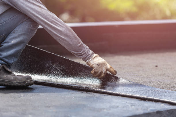 Professional Waterproofing technician working in Glenmont, MD